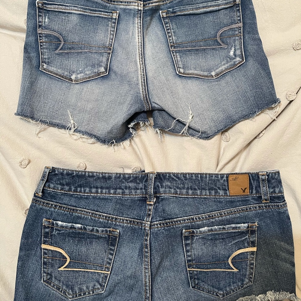 TWO pairs of AE shorts. Both size 10.